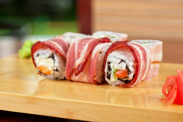 Sushi roll with bacon