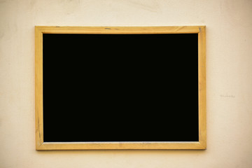 Empty black board (menu board) at a restaurant - nice backgroud