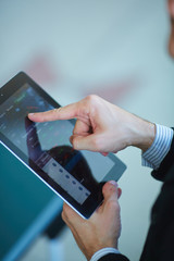 men holding digital tablet