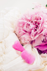 pink peonies and white wedding dress