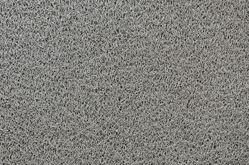 Close up of gray synthetic fiber texture of  household scrubber