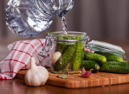 Preparing pickle cucumbers in the kitchen
