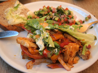 Grilled chicken sandwich with tomato and lettuce