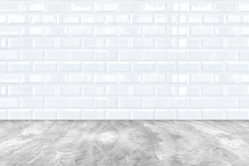 white Ceramic brick tile wall and cement floor