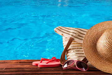 Summer accessories on wooden planks