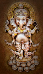 The Indian God Ganesha made from clay in low relief carving