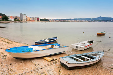 Fototapeta na wymiar Fishing boats, beached