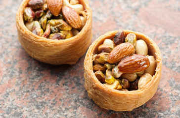 Baskets with nuts on the table