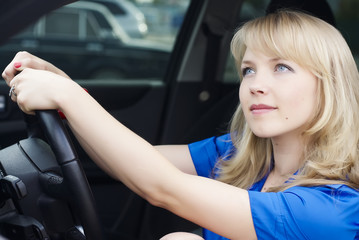 Young woman in a car