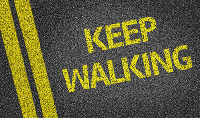 Keep Walking written on the road