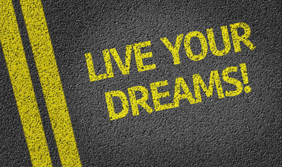 Live your dreams written on the road