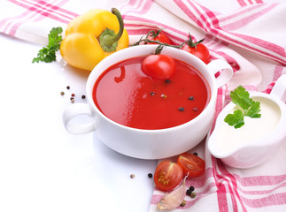 Tasty tomato soup and vegetables, isolated on white