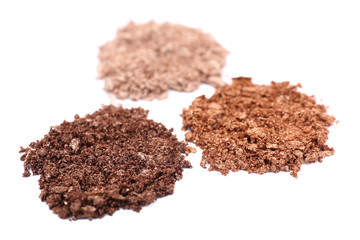 Crushed eyeshadow isolated on white