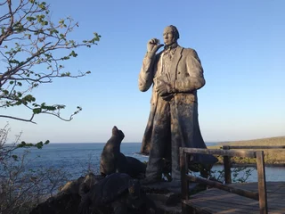 Foto op Canvas darwin statue at san cristobal galapagos islands © TravelTelly