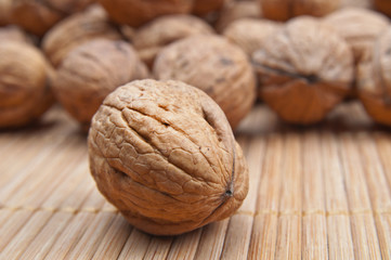 Walnuts on a bamboo mat
