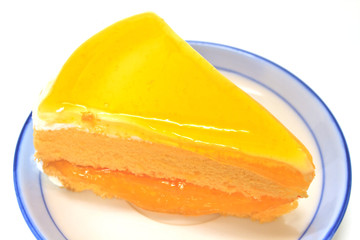  Orange Cheesecake in plate on background