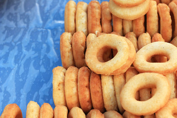 making donut fried in market