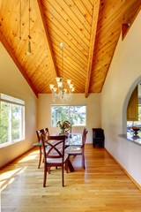 Beautiful dining area with high vaulted ceiling
