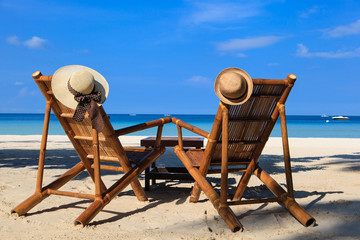 Beach chairs on tropical sand beach in Boracay, Philippines