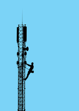 Silhouette of worker climbing on mobile telecommunication tower.