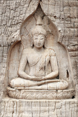 buddha sculpture in wood