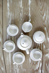 handmade mini tea set on wooden background.m