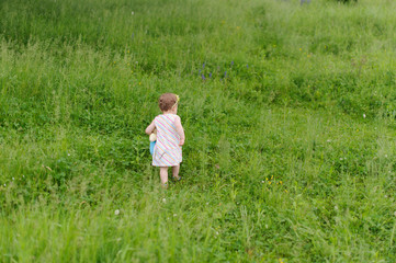 Girl Walking in Field