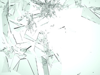Pieces of demolished or Shattered glass on white