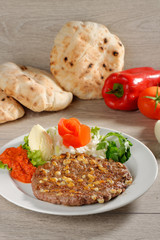 Presliced traditional burger patty called pljeskavica
