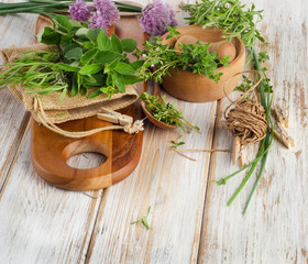 Fresh herbs on a wooden table