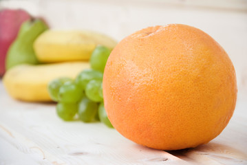 Fruits on a wooden background