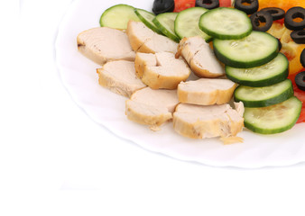 Chicken salad and vegetables.