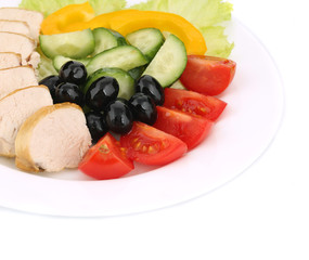 Chicken salad and vegetables.