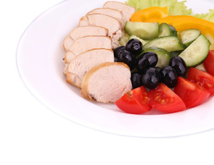 Chicken salad and vegetables.