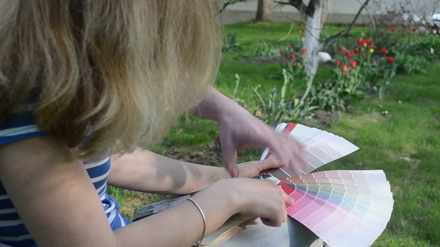 Family man woman disagree choose pick color scale palette garden