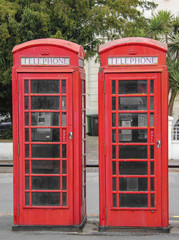 Two red phone booths, England