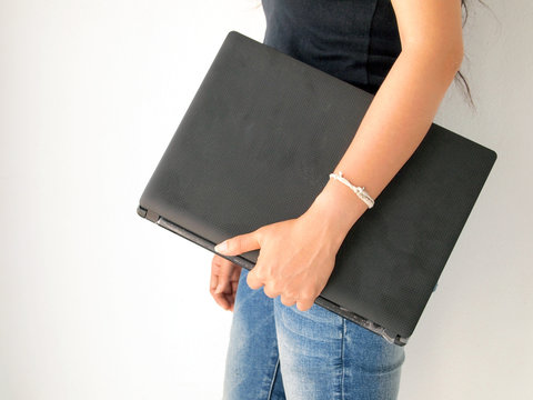 Woman Carrying Her Laptop