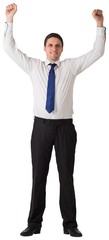 Businessman cheering with hands raised