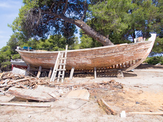Image of a fishing boat being restored