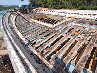 Exposed ribs on a wooden boat