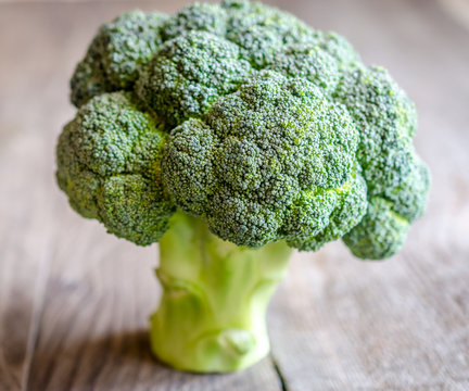 Fresh broccoli on the wooden table
