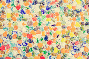 Colorful pebble stone on the wall