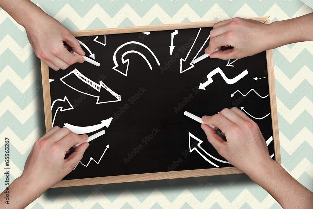 Poster Composite image of multiple hands drawing arrows with chalk
