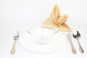 Folded napkin with the tableware