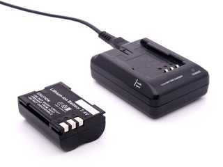 Charger and battery isolated on white