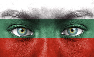 Human face painted with flag of Bulgaria
