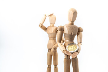 Zeichenpuppen mit Euro-Münze