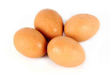 Four brown eggs