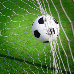 soccer ball in goal © somkanokwan