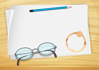 An empty bondpaper with a pencil, an eyeglass and a coffee stain